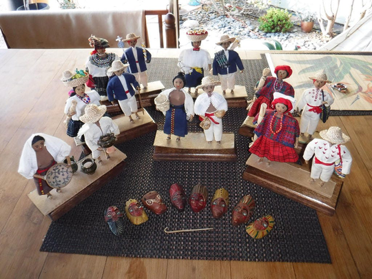 Guatemalan Folk Art Vintage Village Dolls Seven Pairs Mounted On Cardboard With Wooden Stands & 8 Carved Masks