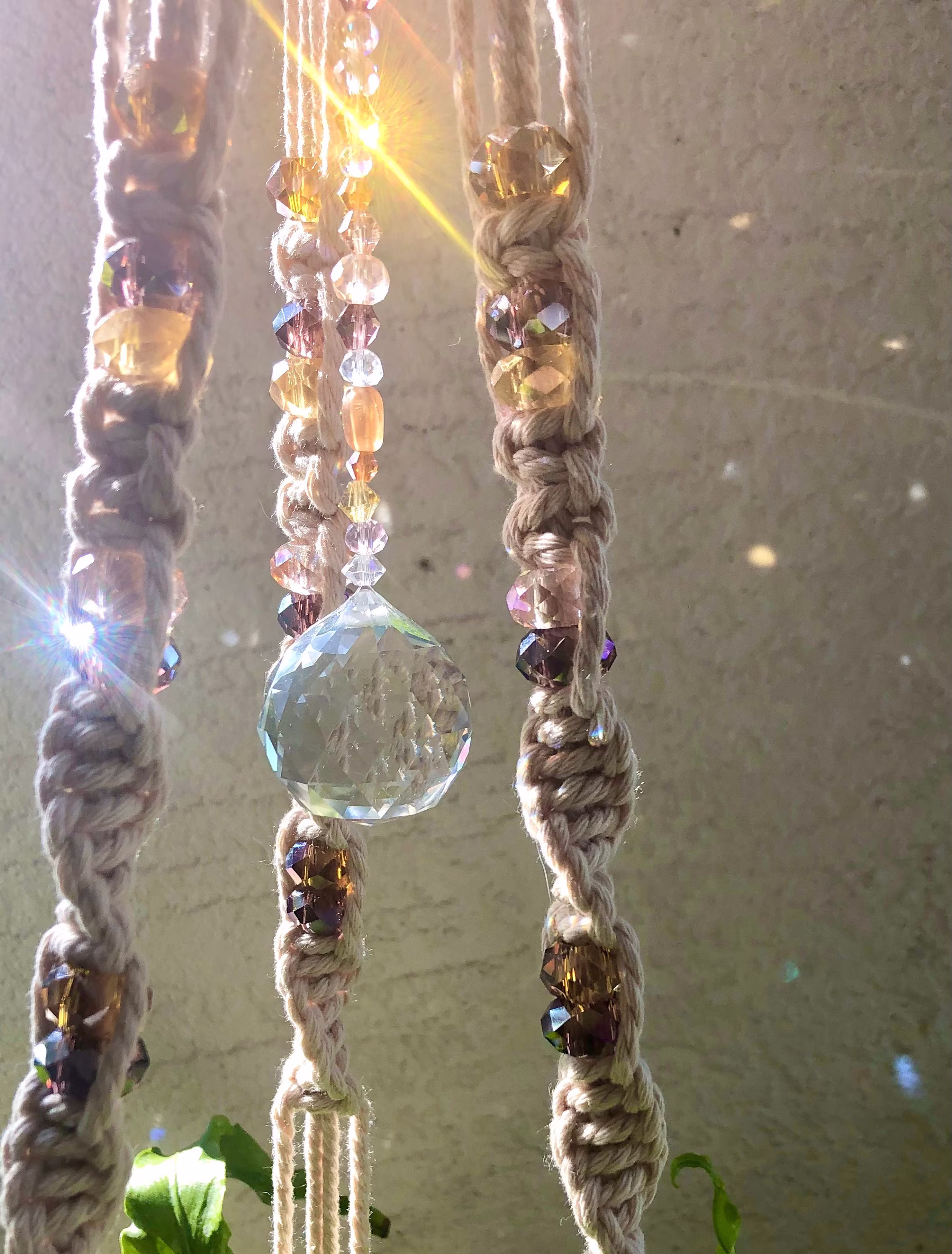 Rose Gold Love Suncatching Macrame Plant Hanger With Iridescent Crystals in Pinks & Golds Center Prism From The Sunset Collection