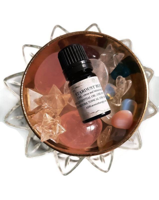 stardust Essential Oil Blend. Geranium, Ylang Flowers, Lemon Balm, Vetiver. 5 Ml