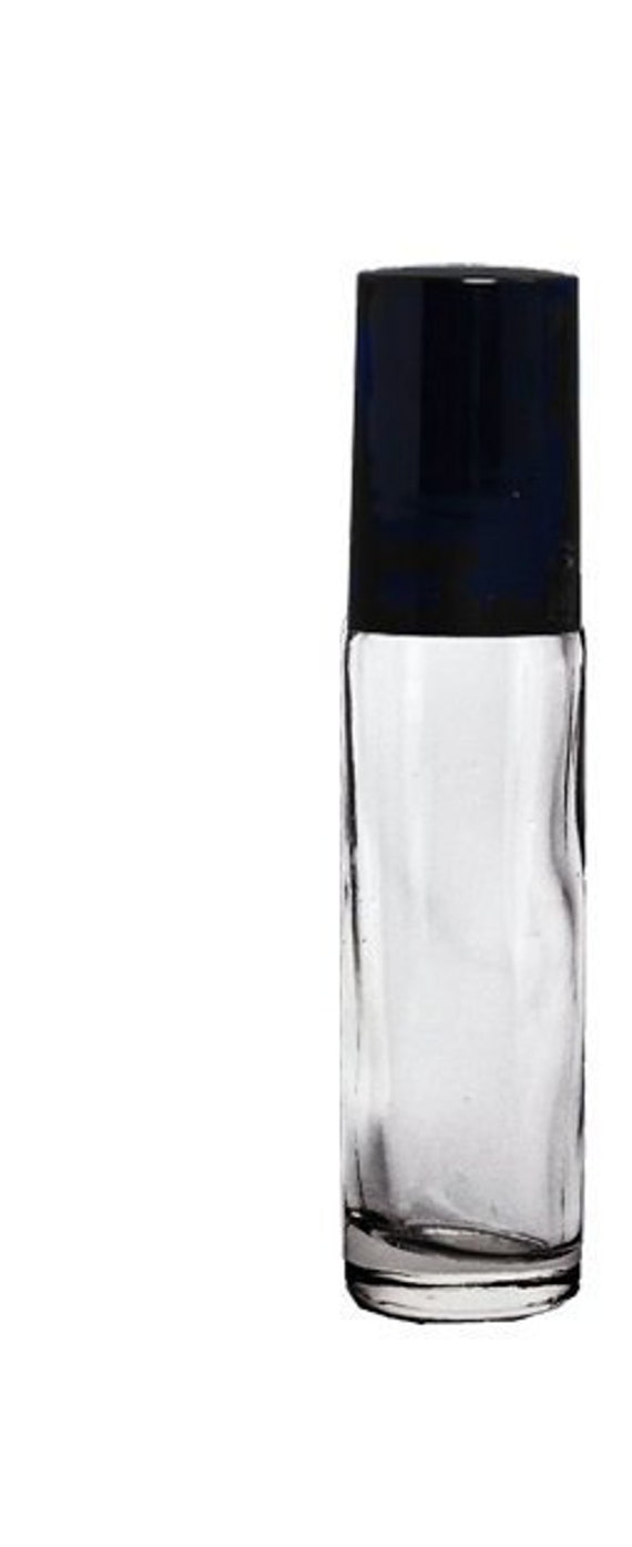 Custom Blend Perfume Oil. Similar Accords & Notes To La Nuit De L Homme For Men in A Clear Glass 10Ml Roller Bottle With Black Cap