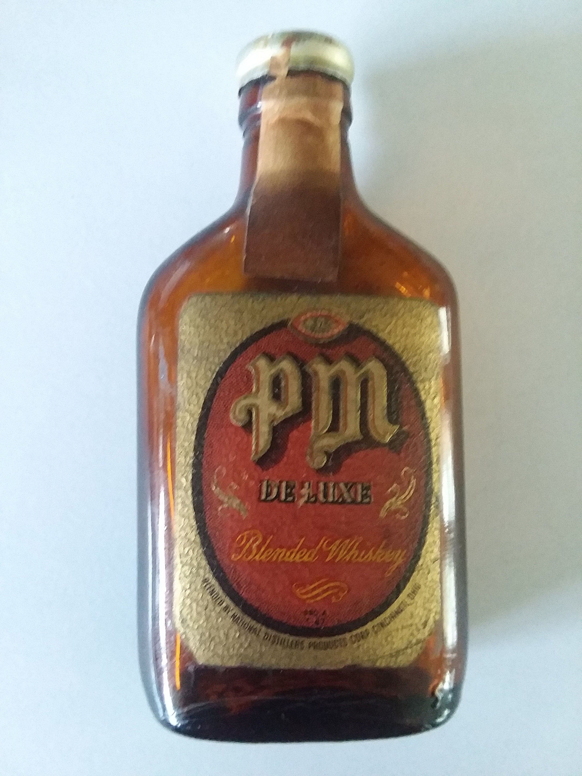 Vintage Pm Deluxe Blended Whiskey Amber Glass Bottle 1/10 Pt