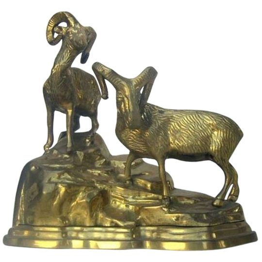 Brass Rams On Rock