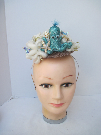 Curly Turquoise Octopus in Ocean With Authentic Sea Shells