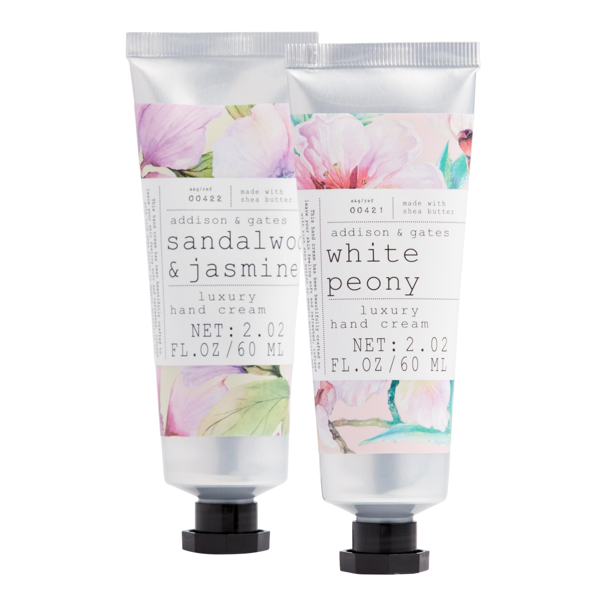 A&G Watercolor Flowers Hand Cream: Pink/Purple - Plastic by World Market