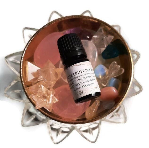 White Light Essential Oil Blend. Cinnamon Bark, Wild Oranges. 5 Ml