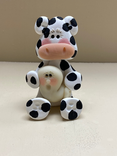 Cow Holding A Glow in The Dark Ghost