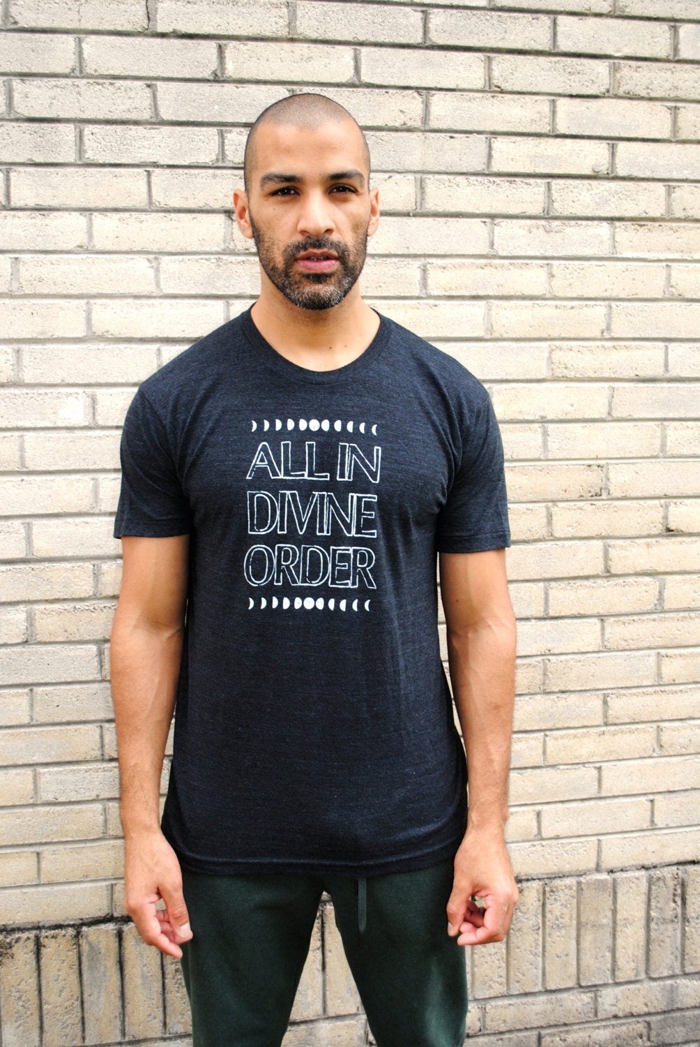 All in Divine Order Unisex Tri-Blend Tee