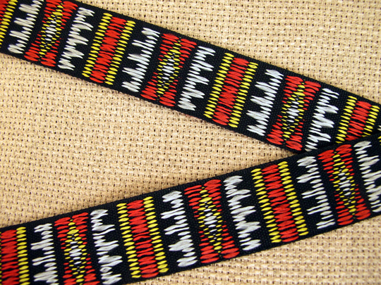Saddle Ride Jacquard Trim. Red, Mustard Yellow, Slate Grey On Black. Sold By The Yard. 1 Inch Wide. 2064-A. Colorful Geometric Trim Ribbon