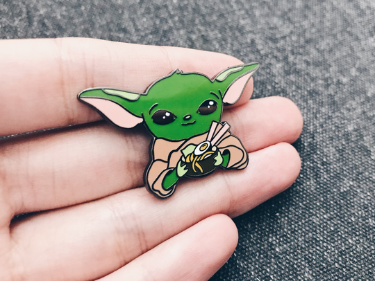 The Cosmic Ramen Child Enamel Pin - Little Yo's Cantina Lapel Pin- Greeting Baby Alien