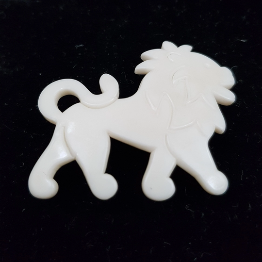 Vintage Lion Carved Pin Made From Early Plastic