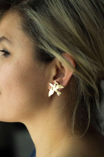Girl With Crow Earrings