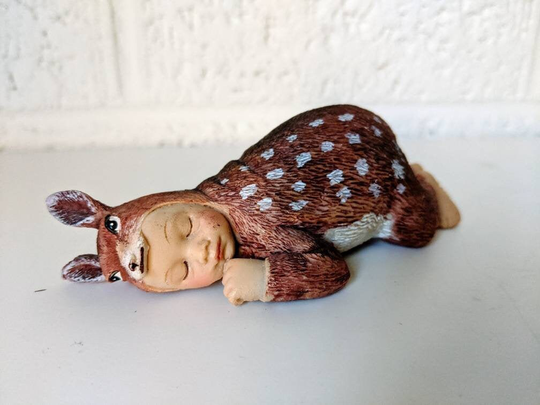 Vintage Figurine Child Asleep in Deer Costume
