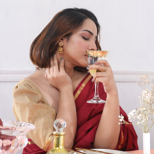 Tarinika Antique Gold Plated Lakshmi Idol Earrings