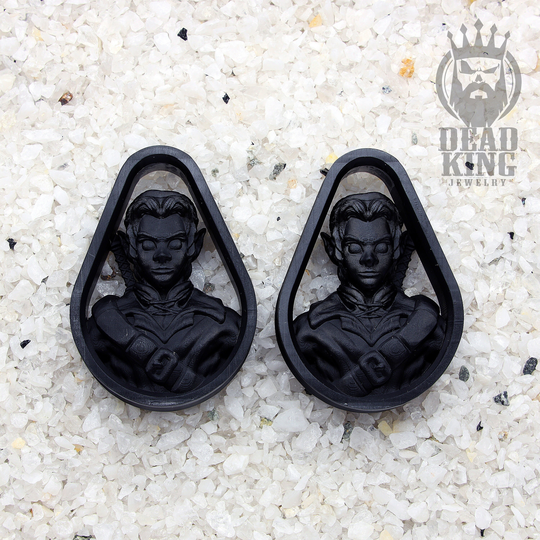 A Pair Of Link From Zelda Teardrop Black Earplugs. Unique Ear Tunnels. Lightweight Plugs. Double Flare Plugs