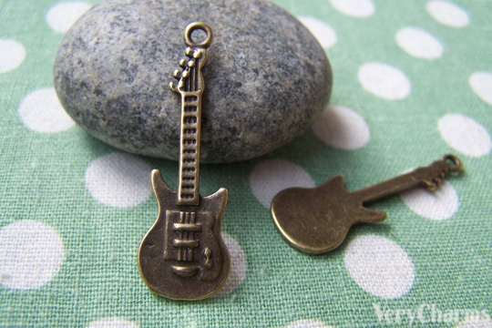 10 Pcs Of Antique Bronze Guitar Charms 11x35mm A1319
