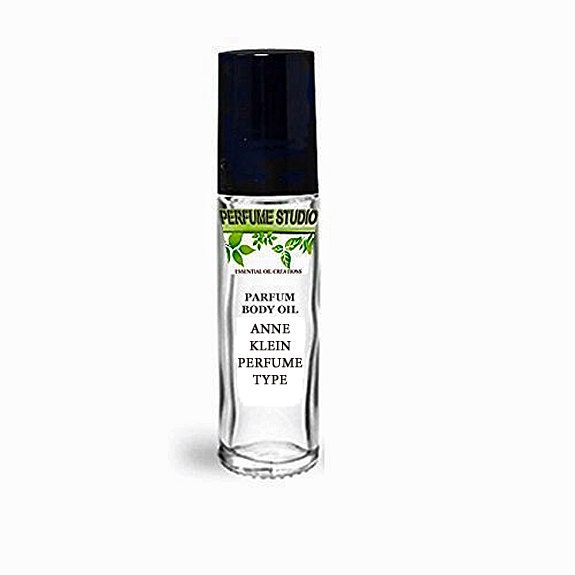 Ak Custom Blend Oil With Similar Base Notes To Original Perfume For Women. Clear Glass 10Ml Roller Bottle, Black Cap