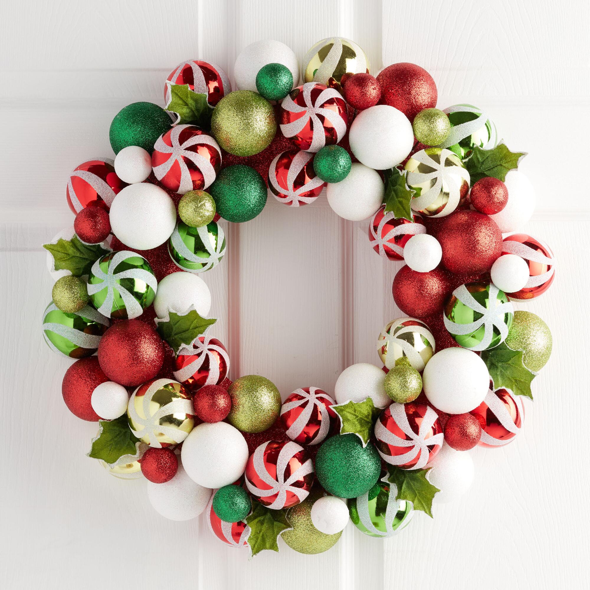 Pier Place Peppermint Ball and Faux Holly Leaf Wreath: Green/Red/White - Plastic by World Market