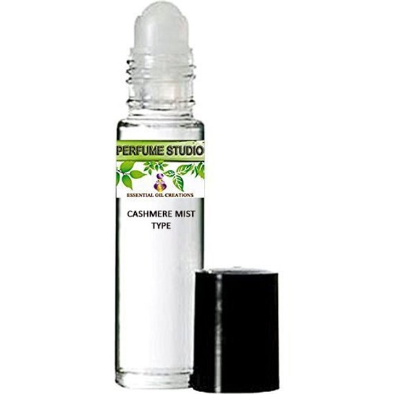 Premium Custom Blend Perfume Oil. Similar Base Notes Of Cashamere Mist For Women in A Clear Glass 10Ml Roller Bottle With Black Cap